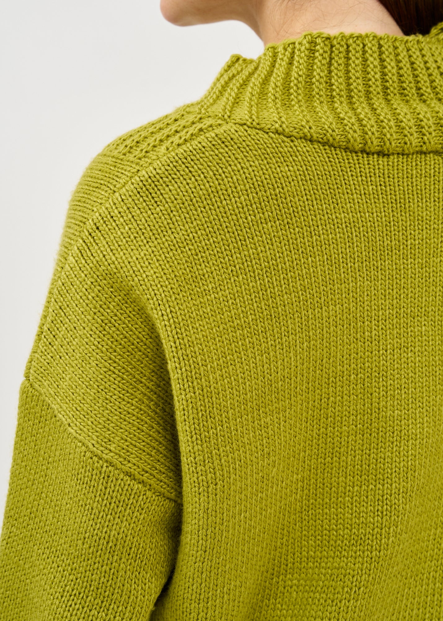 Green zippered knit top