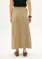 Skirt with zippers and brown ribbon combination