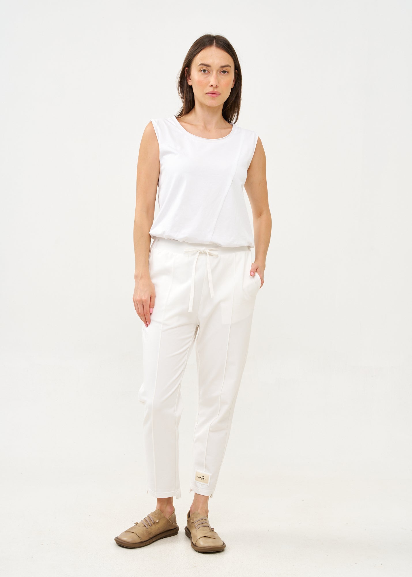 Pants seam in the middle and a white patch