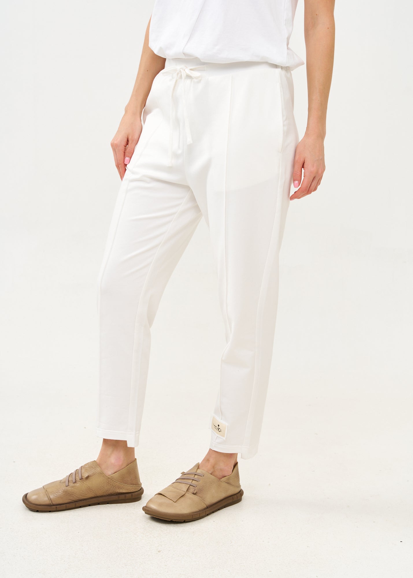 Pants seam in the middle and a white patch