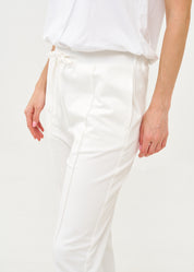 Pants seam in the middle and a white patch