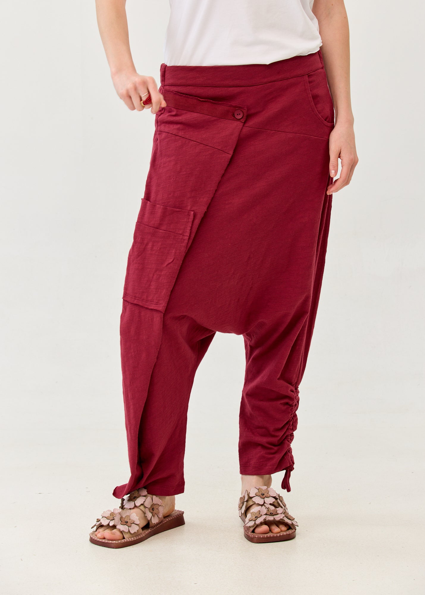 Cotton sack trousers with burgundy ribbon detailing
