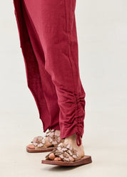 Cotton sack trousers with burgundy ribbon detailing
