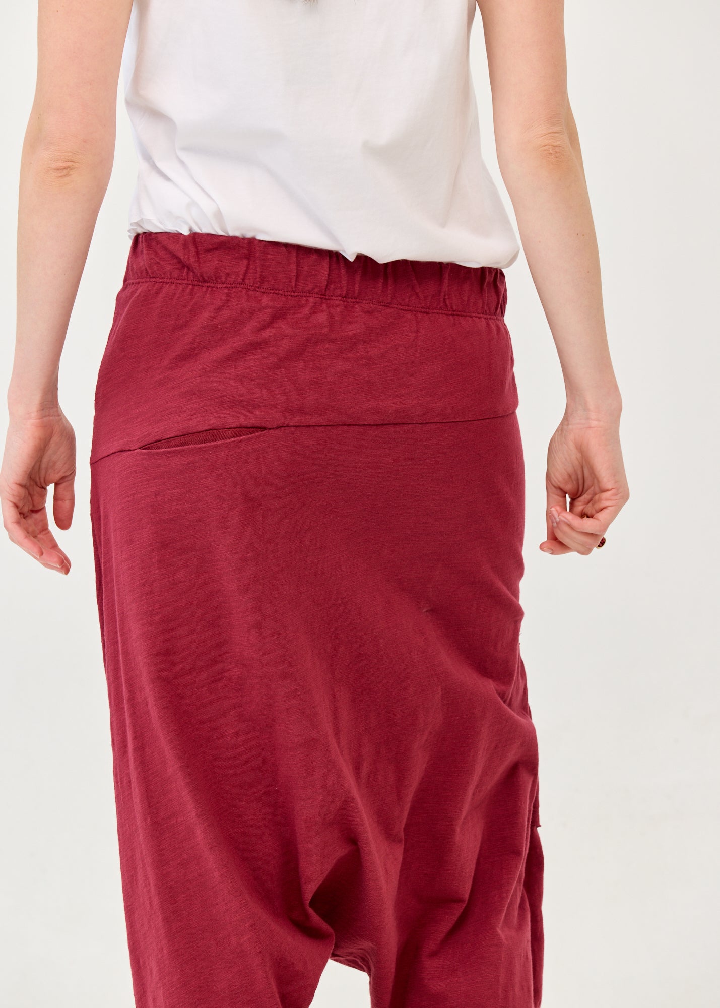 Cotton sack trousers with burgundy ribbon detailing