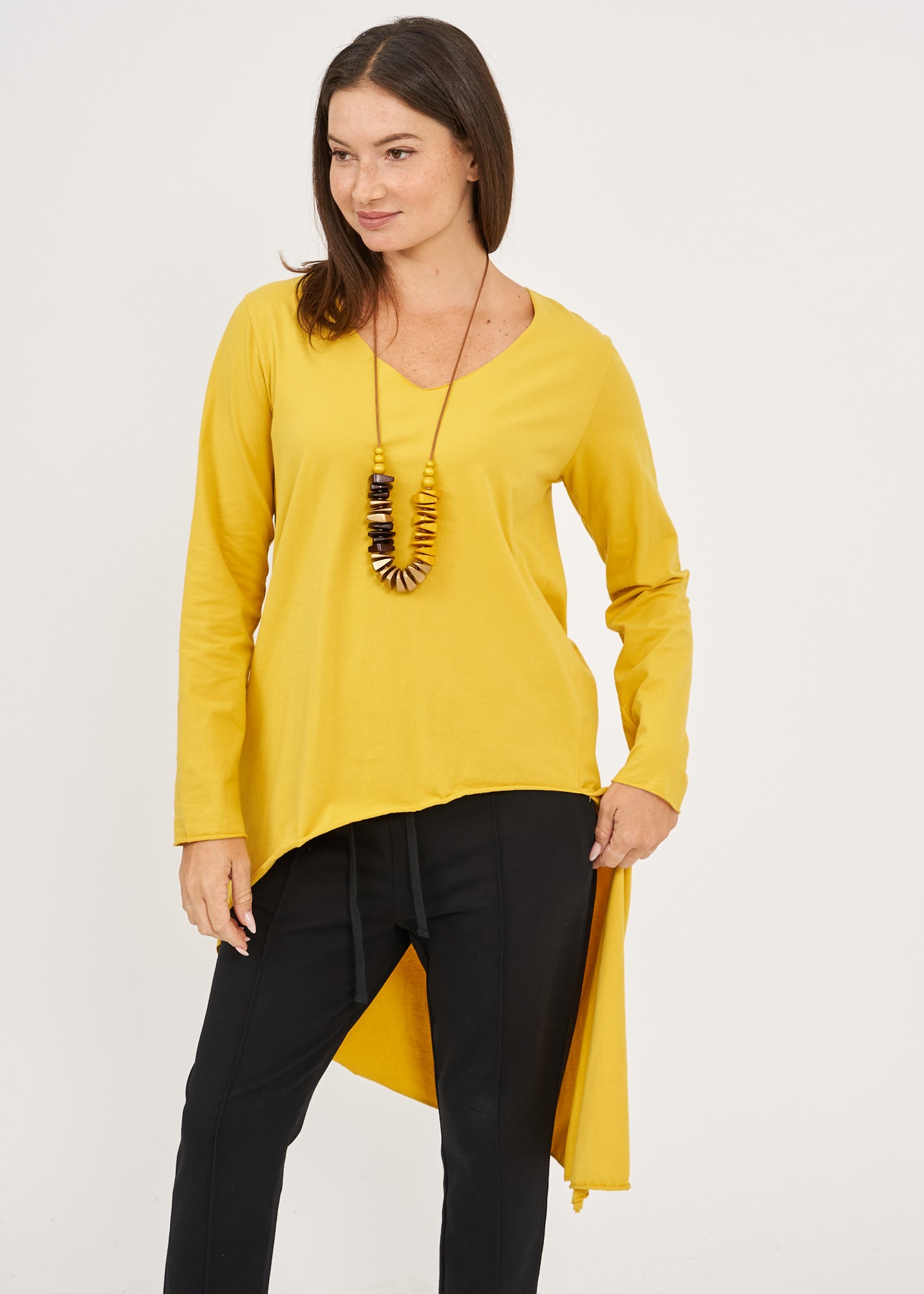 Long sleeve shirt with V-neck and long back in orange