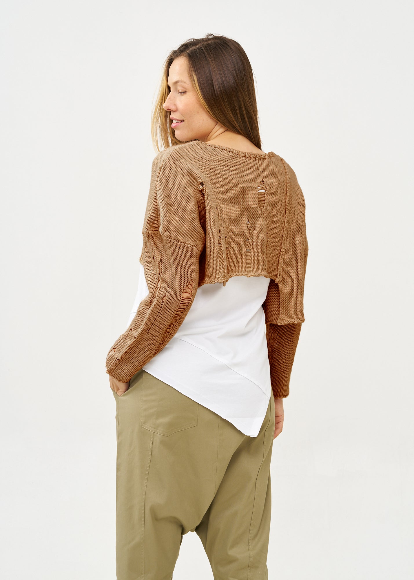 Asymmetrical extension knit with brown fringes