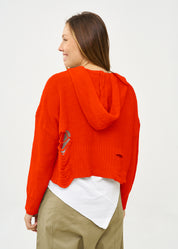 Knitwear with orange braid extension cap