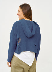 Knitwear with a blue braid extension cap