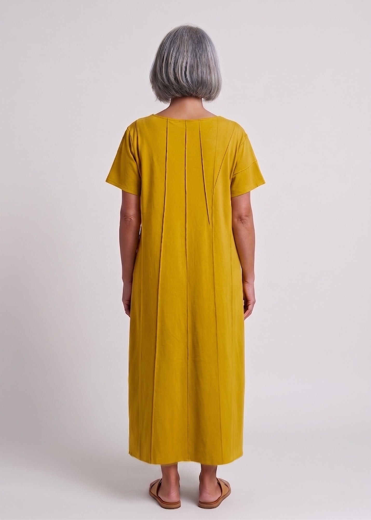 Mustard short-sleeve dress with prominent seams