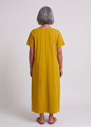 Mustard short-sleeve dress with prominent seams
