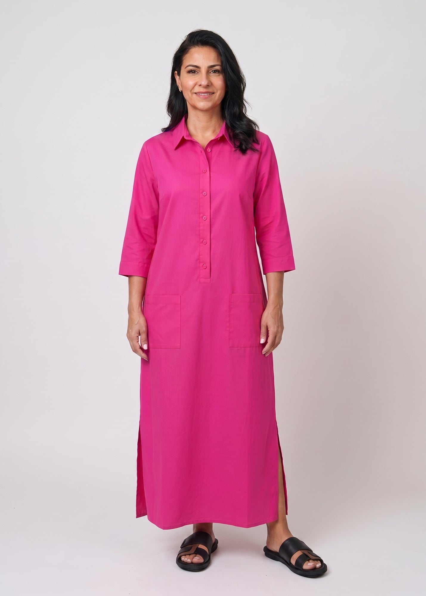 Fuchsia dress with a partial button placket and square pockets