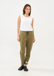 Pants seam in the middle and a dark green patch