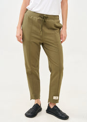 Pants seam in the middle and a dark green patch