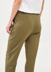 Pants seam in the middle and a dark green patch