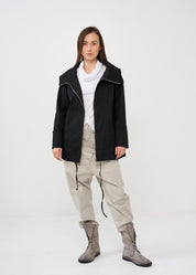Black zipped jacket with cut-out pockets