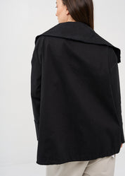 Black zipped jacket with cut-out pockets