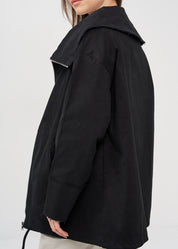Black zipped jacket with cut-out pockets