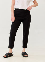 Black trousers with lycra, elastic, and an internal drawstring