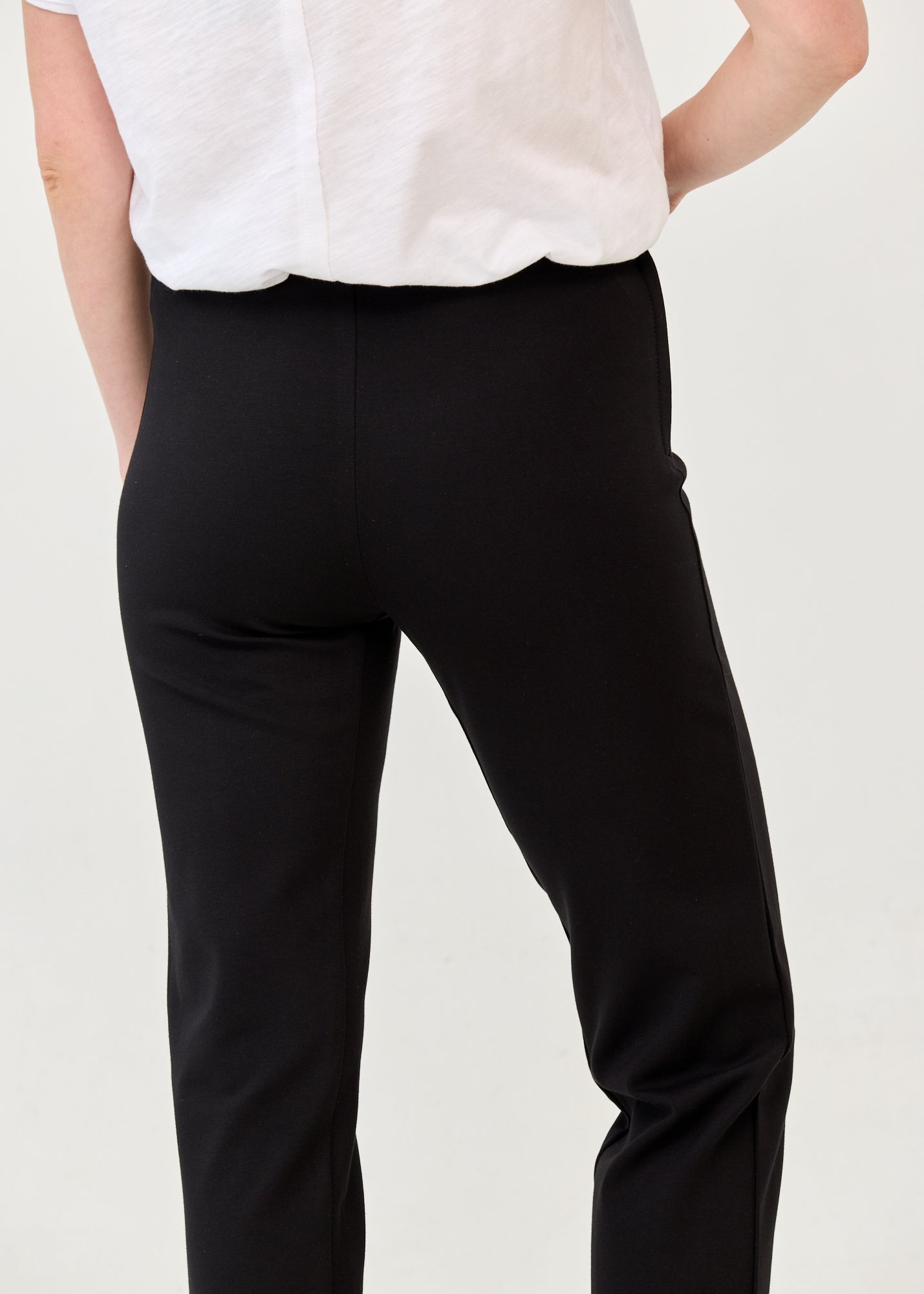 Black trousers with lycra, elastic, and an internal drawstring