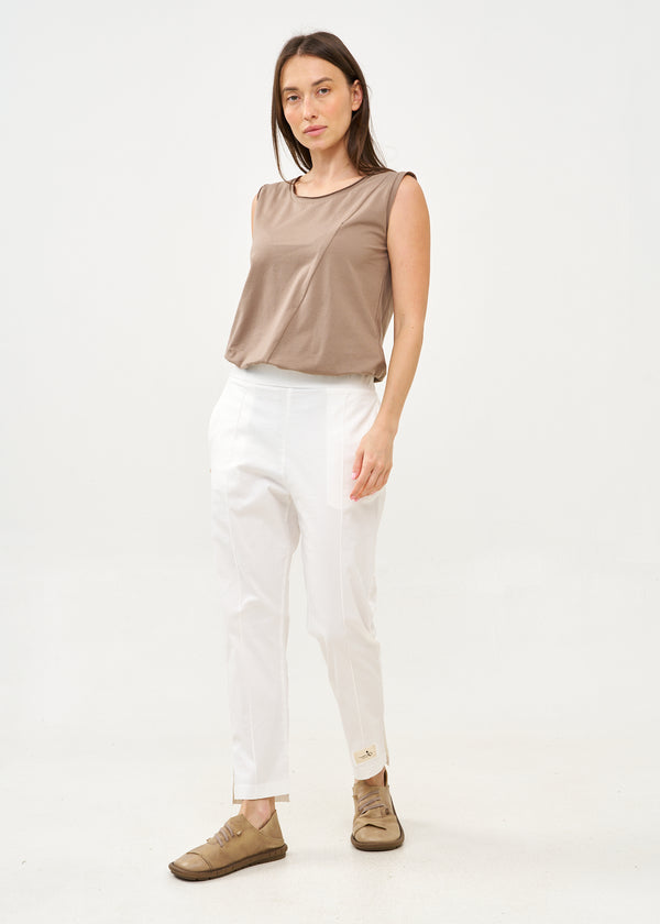 Pants with a center seam and a new white patch