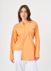 Orange button-down shirt with ribbon on the back