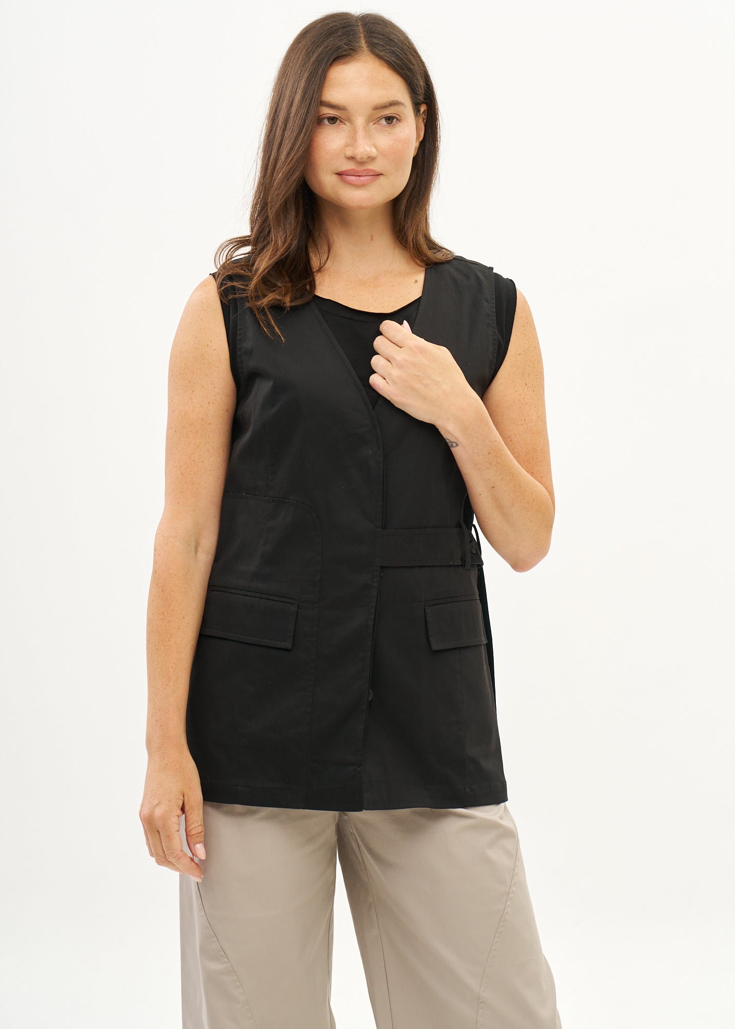 Black vest with a half-belt