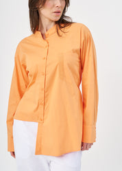 Orange button-down shirt with ribbon on the back