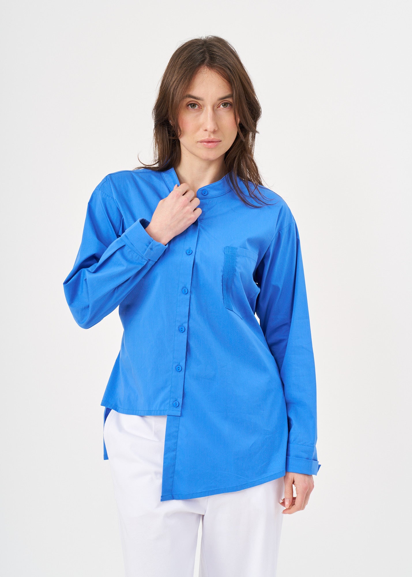 Blue button-down shirt with ribbon on the back