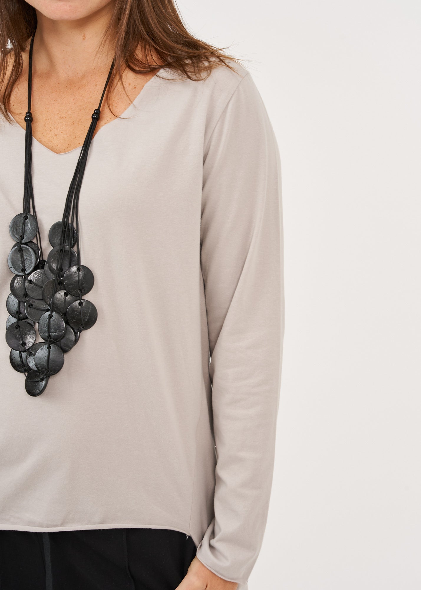 Light gray long sleeve V-neck long back shirt