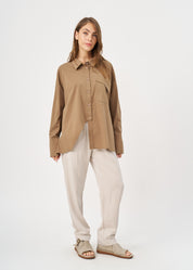 Brown button-down shirt with diagonal hem and pocket