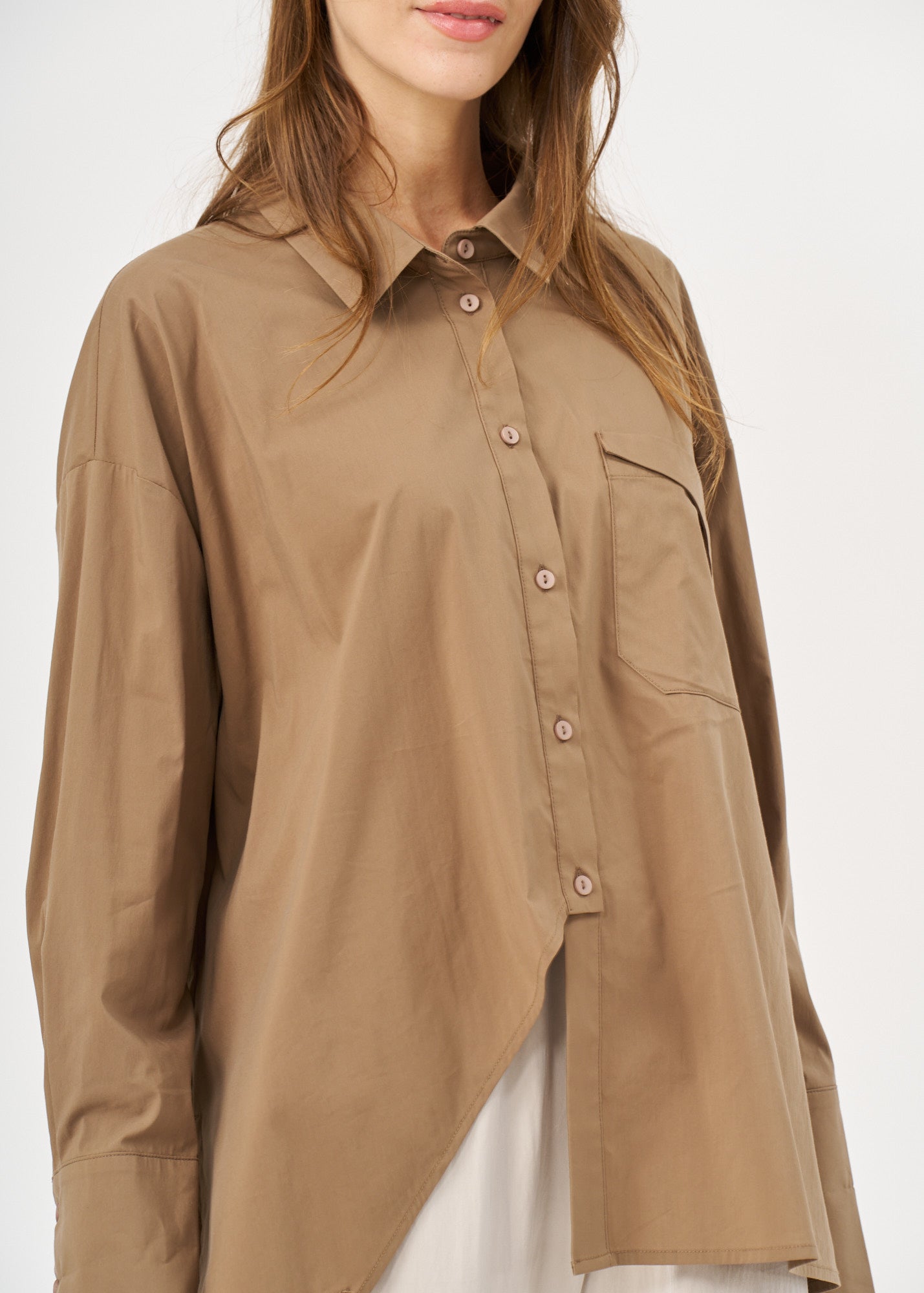 Brown button-down shirt with diagonal hem and pocket