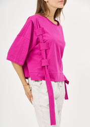 Short sleeve shirt with purple side ribbon