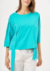 Short sleeve shirt with turquoise side ribbon