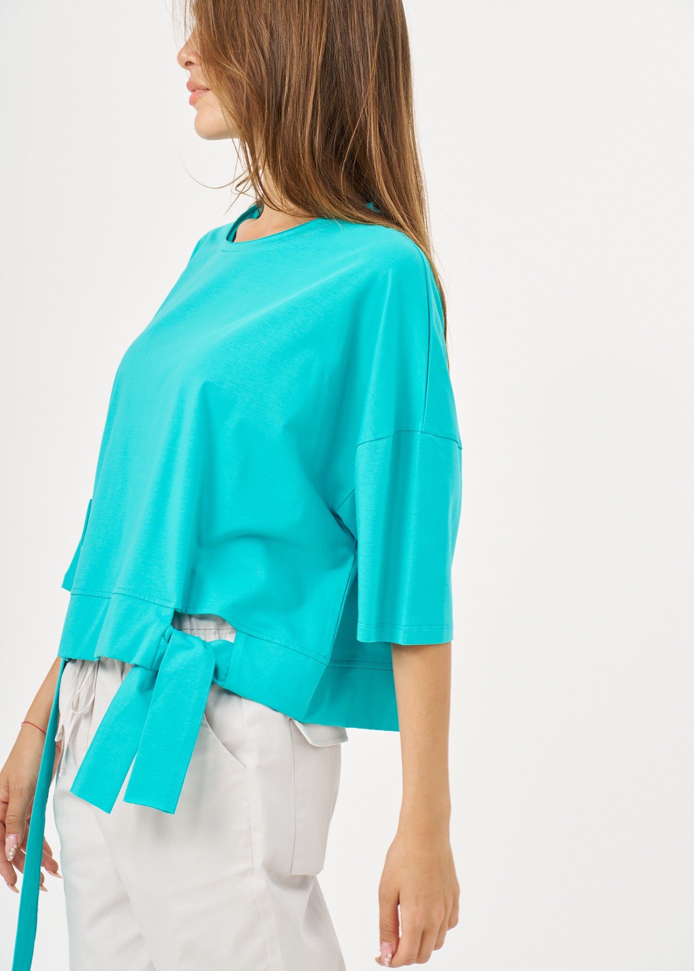Short sleeve shirt with turquoise side ribbon