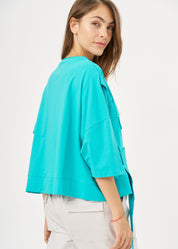 Short sleeve shirt with turquoise side ribbon
