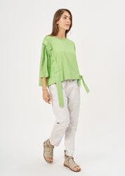 Short sleeve shirt with light green side ribbon