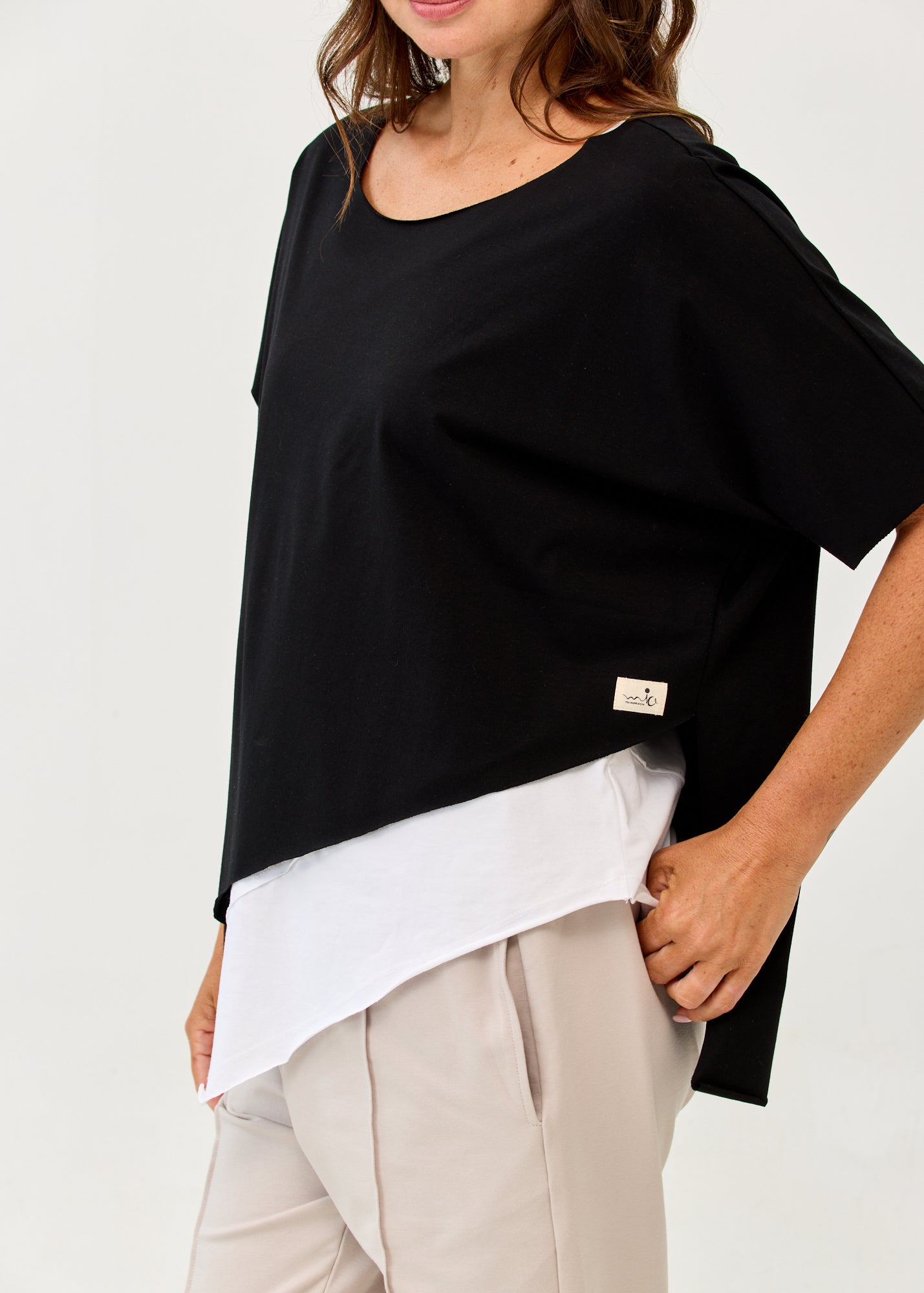 Black diagonally stitched shirt with 3/4 sleeves
