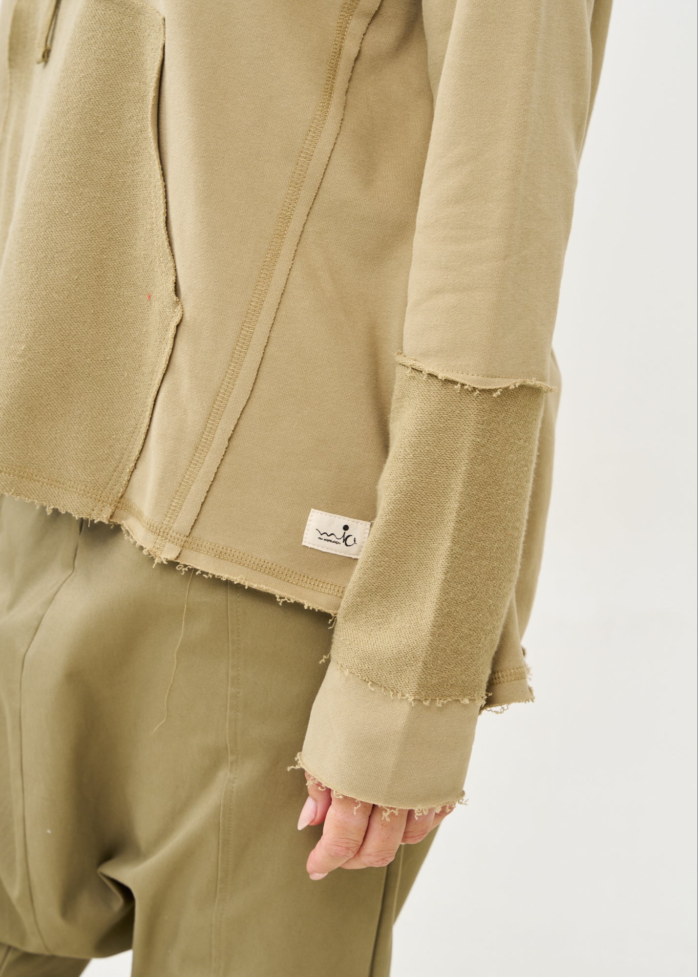 Sweatshirt with a hat and external cuts, brown