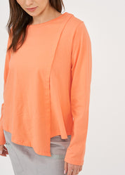 Orange long-sleeved asymmetrical pleated shirt