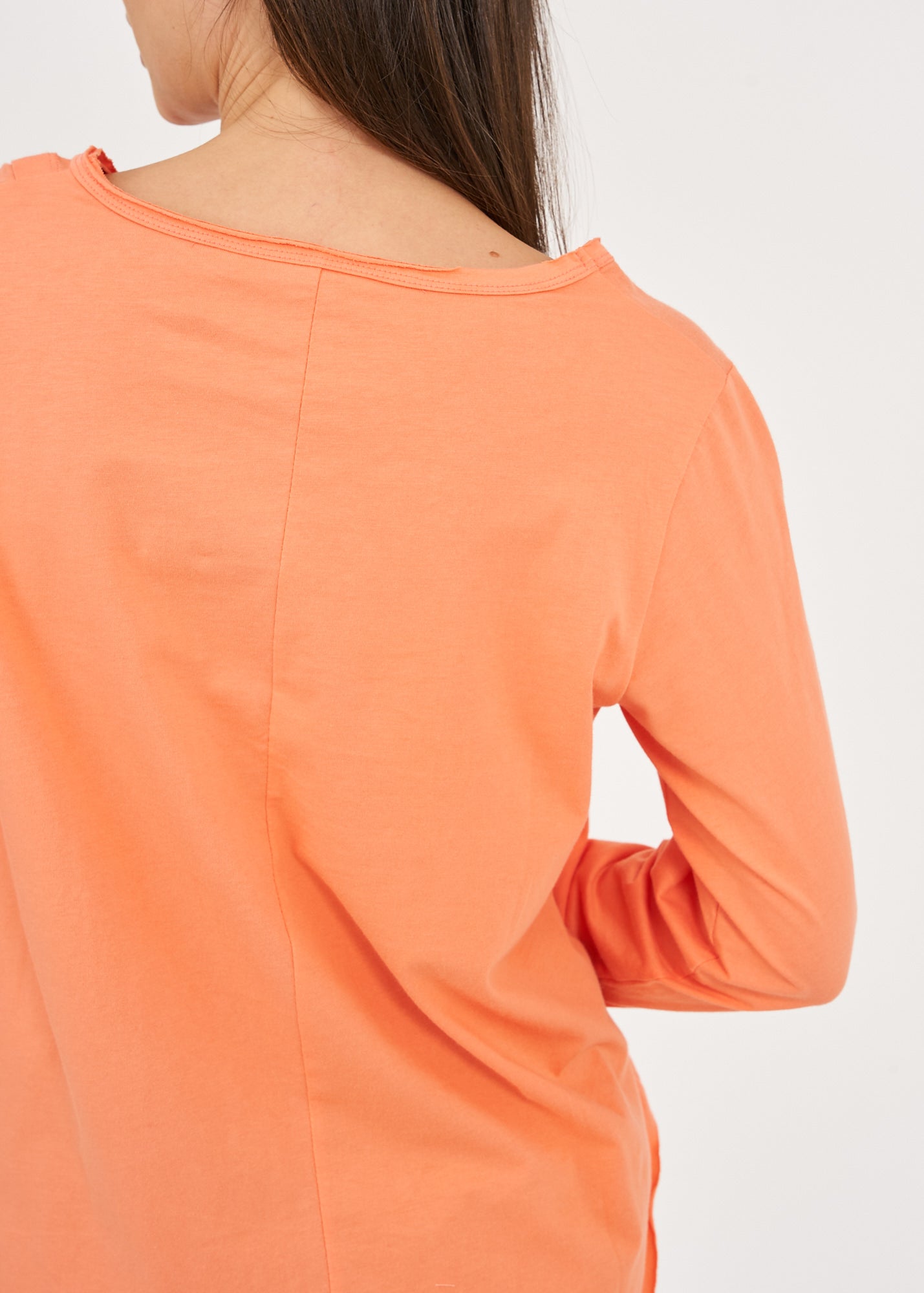 Orange long-sleeved asymmetrical pleated shirt