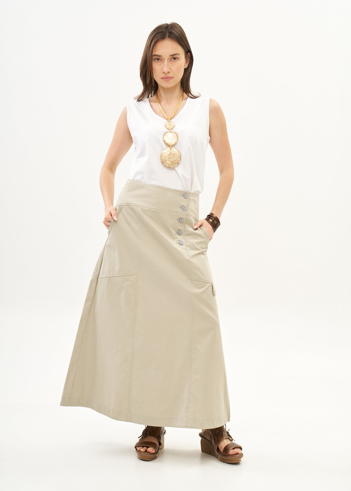 Button closure skirt with stone ribbon combination