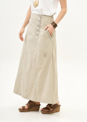 Button closure skirt with stone ribbon combination