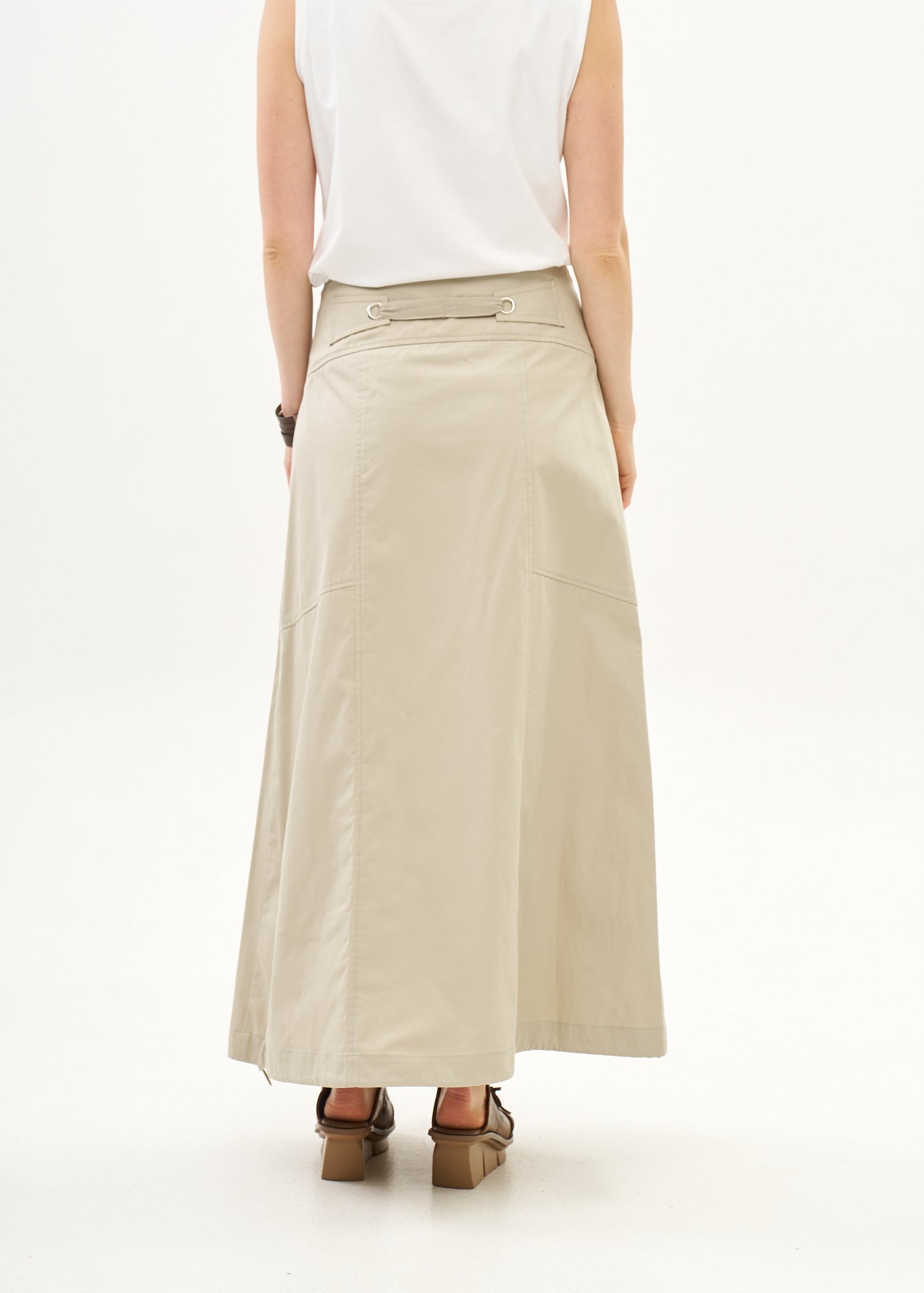 Button closure skirt with stone ribbon combination
