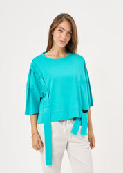 Short sleeve shirt with turquoise side ribbon