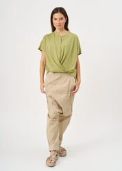 Green button-down shirt with a twisted hem