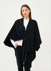 Black cape with diagonal closure