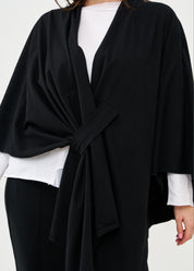 Black cape with diagonal closure