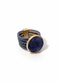 Leather strap ring with dark blue stone-like element - 18