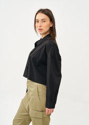 Black button-down shirt with long shoulder straps