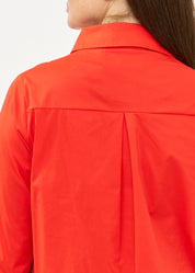 Red button-down shirt with half-waist and pleats